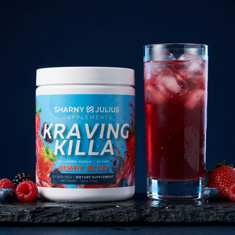 Kraving Killa Berry Bliss tub with a glass of iced berry drink
