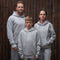 The Family Tracksuit - Sharny, Julius and son wearing matching grey marle tracksuits