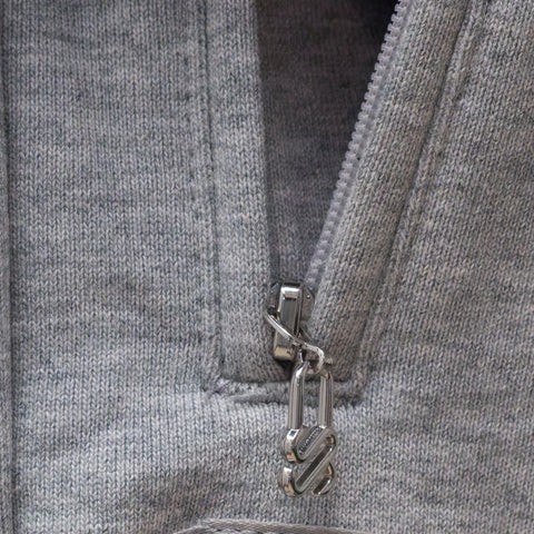 Custom 3-piece steel zipper puller close-up