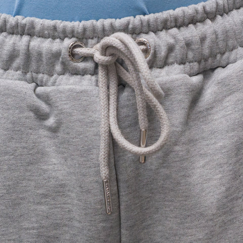 Custom steel rope ends on drawstring detail