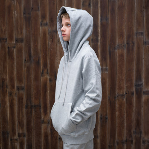 The Family Tracksuit - kid side profile with hood up